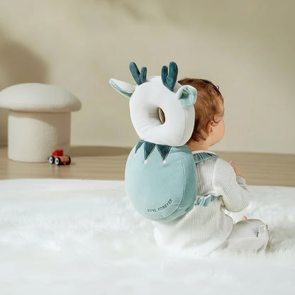 Baby wearing an anti-fall head guard with Aibedila logo and text on a neutral background